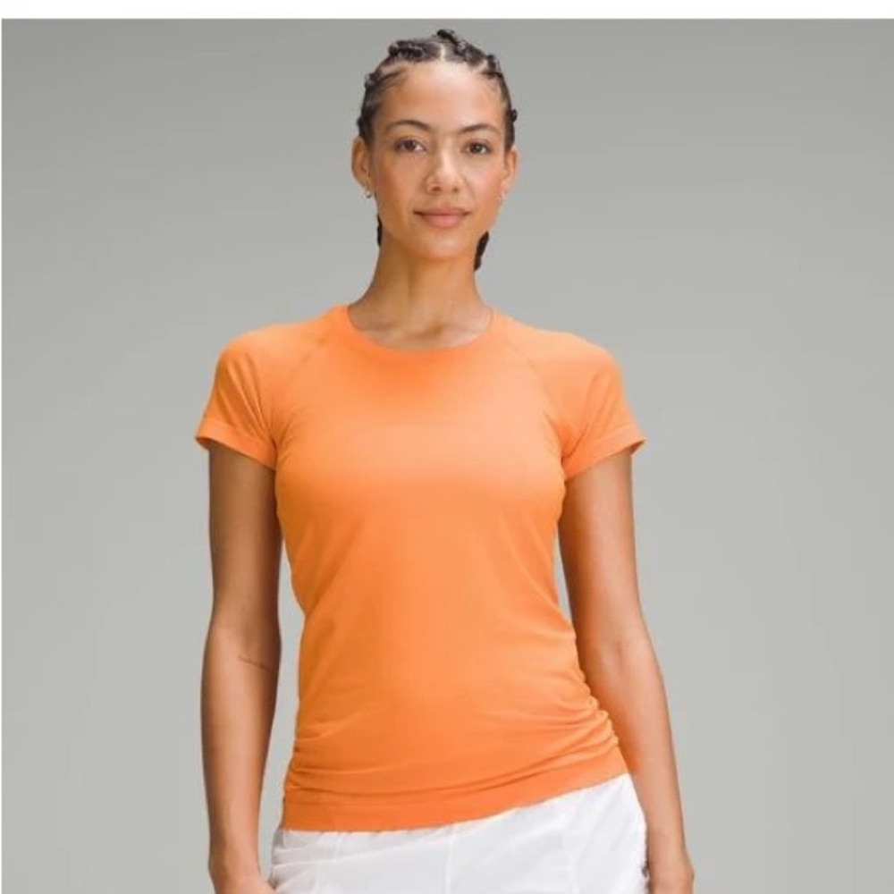 Lululemon Swiftly Tech Size 4 in Orange Soda